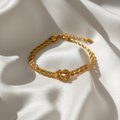 سوار Rope ذهبي بعقدة أنيقة – تصميم مضفّر
