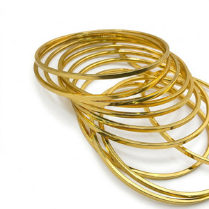 7-Piece Flat Gold Bangle Set – Stackable Thin Gold Bangles | Bunniwear